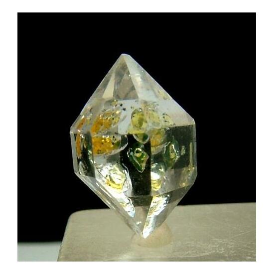 Quartz With Hydrocarbon Inclusions